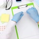 top view of the doctor's workplace, holding a white sheet of paper - VideoHive Item for Sale