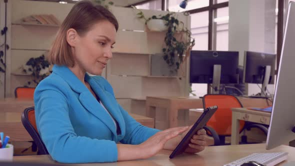 Portrait Woman with Gadget at Work