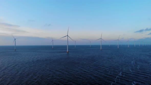 Windmill Park in the Ocean Drone Aerial View of Windmill Turbines Generating Green Energy Electric