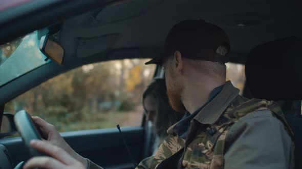 Terrifying Woman Zombie Attacking Young Man Driver During Apocalypse