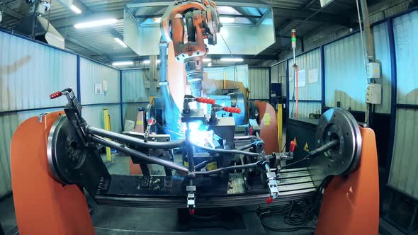 Welding Mechanism Is Processing Carcass of a Bicycle