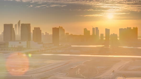 Buildings on Al Reem Island in Abu Dhabi at Sunset Timelapse From Above