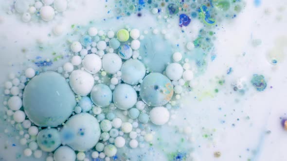 Slow Motion of Bright Colored Bubbles alt