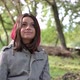 portrait of happy smiling young woman in forest natural park - VideoHive Item for Sale