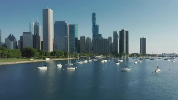 Epic Drone Aerial Footage Over the Chicago Marina with Cityscape on Background