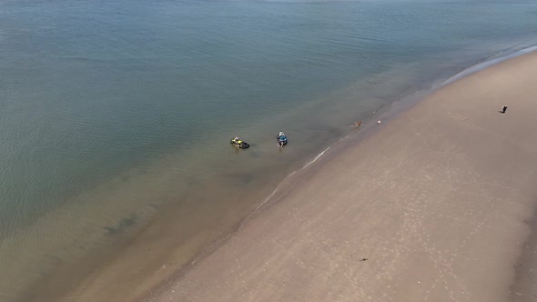 An aerial view of Gravesend Bay in Brooklyn, NY as two jet ski riders prepare to enjoy the day. The