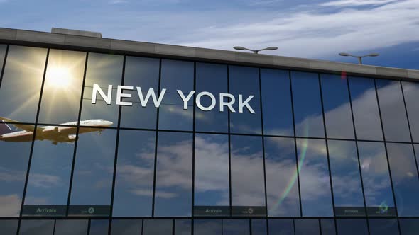 Airplane landing at New York USA airport mirrored in terminal