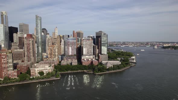Aerial view in front of Battery park city, summer in New York, USA - pan, drone shot