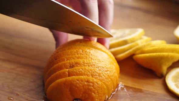 Slicing citrus fruit orange