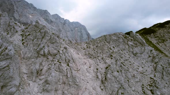 This aerial video shows the Kamnik-Savinja Alps in Slovenia. Captured on one of the highest peaks na