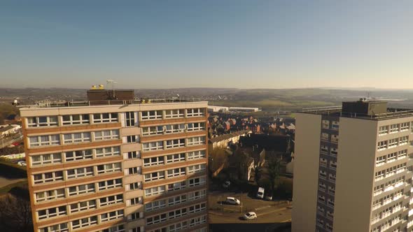 Aerial footage view of high rise tower blocks, flats built in the city of Stoke on Trent to accommod