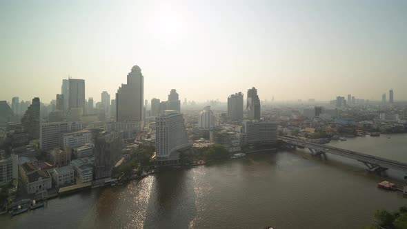 Time lapse of Bangkok City skyline by Chao Phraya River in Thailand. Financial district