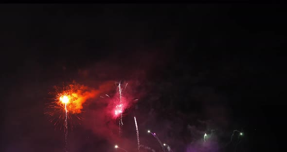 Real colorful fireworks display in the dark sky