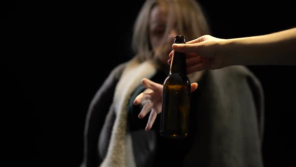 Alcohol Addicted Woman Greedily Drinking Beer Suffering Withdrawal, Shaking