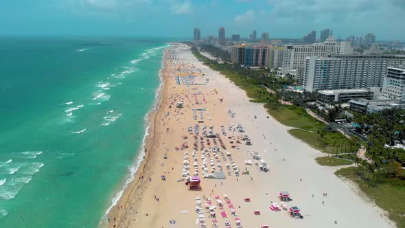 Miami South Beach Sunrise with Lifeguard Tower and Coastline with Colorful Cloud and Blue Sky South