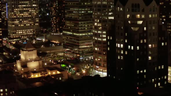 AERIAL: Downtown Los Angeles, California at Night, Glowing City Lights