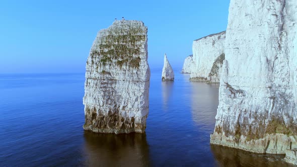 Close Fly by of Chalk Cliffs in England