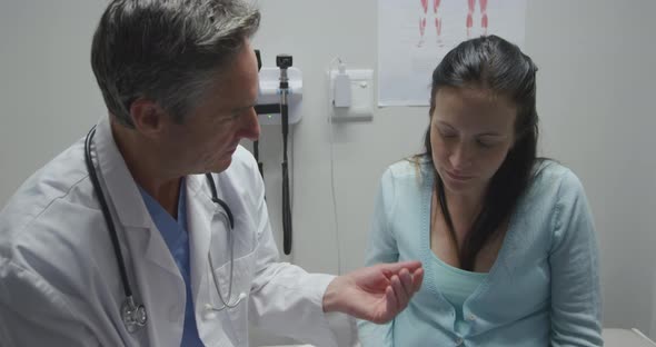 Medical professional and patient alt