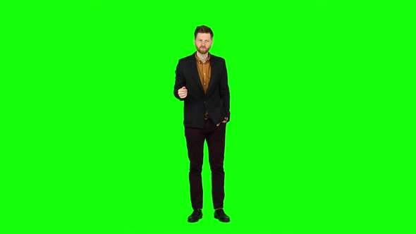 Guy in the Suit Got Angry and Started Shouting Loudly. Green Screen