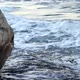 A Beautiful Closeup Shot of a Rocky Beach Washed By Ocean Waves - VideoHive Item for Sale
