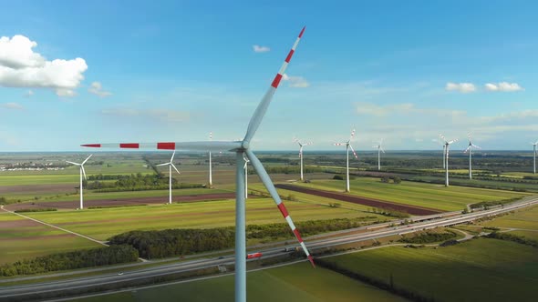 Aerial View of Wind Turbines Farm in Field. Austria. Drone View on Energy Production