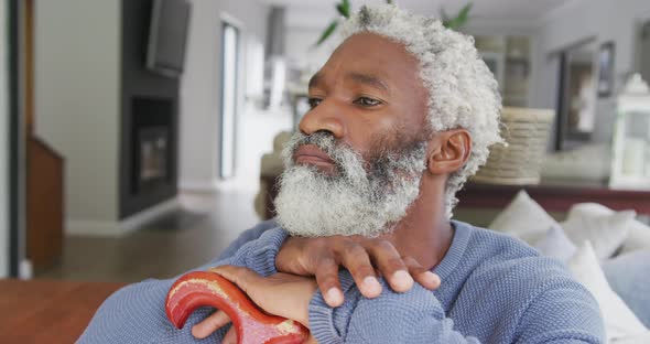 Video of sad african american senior man with walking stick