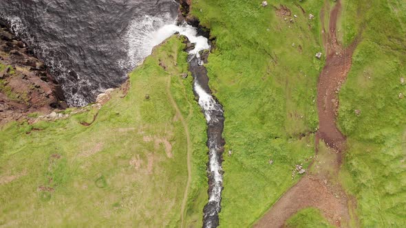 Stunning Waterfall Splashing From Cliff Aerial View