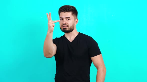 Crazy Young Caucasian Guy in Black T-shirt