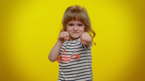 Funny Aggressive Blonde Kid Child Trying to Fight Shaking Fist Boxing with Expression Punishment