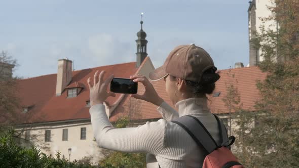 Tourist Makes a Photo on a Smartphone