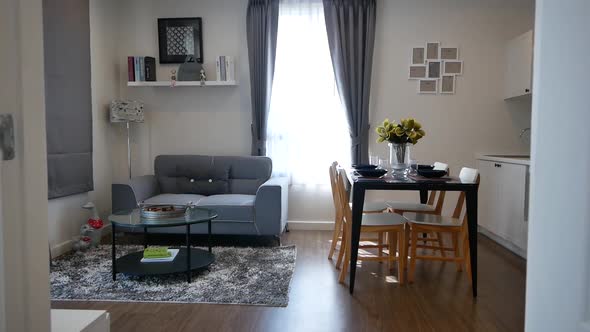 Nicely Decorated Cozy and Compact Living Area Connecting With Pantry Area