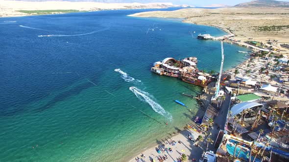 Aerial view of famous zrce party beach of Pag island in the morning, Croatia