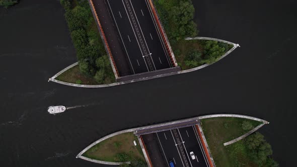 A Netherlands aquaduct is a type of viaduct (bridge) for a watercourse (river, canal) or water main,