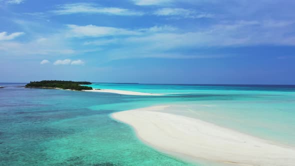 Aerial landscape of perfect lagoon beach vacation by blue green lagoon and white sandy background of