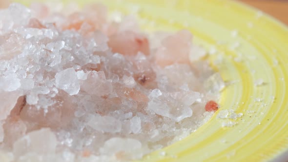 Close Up of Pink Rock Salt in a Bowl on Table