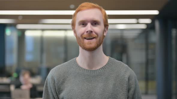 Portrait of Young Man Talking on Online Video Call