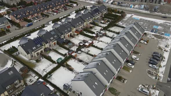 Aerial View of Small European City with Modern Residential Suburb Neighborhood