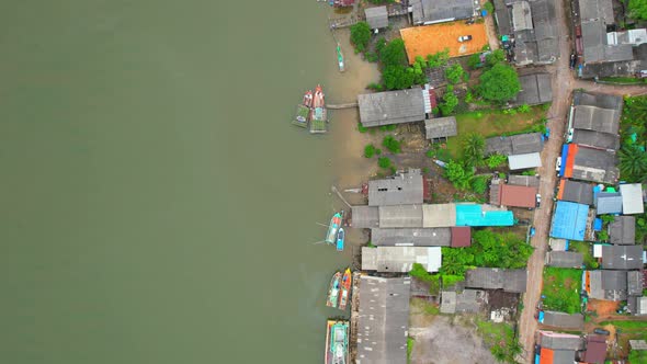 A drone is flying over a fishing village