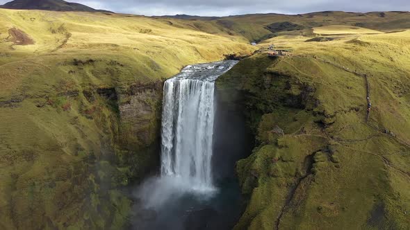 big waterfall in iceland mountains