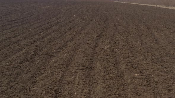 Fertile soil prepared for spring sowing 4K drone video