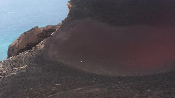 Sportsman Running in Crater of Capelinhos Volcano Faial Island Azores