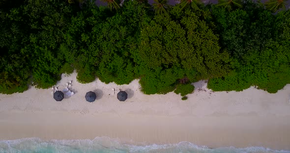 Wide above abstract view of a summer white paradise sand beach and blue ocean background in hi res 4