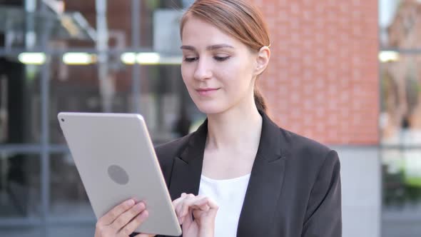 Young Businesswoman Using Tablet Outdoor