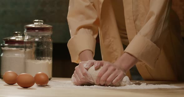 Kneading Dough for Pizza with Hands Flour Baking Pastry at Home