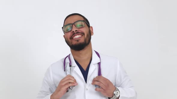 Smiling face of a young Arab man close-up.