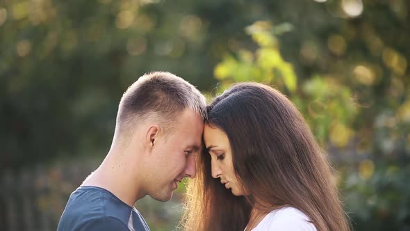 Romantic Couple Talking Face To Face.