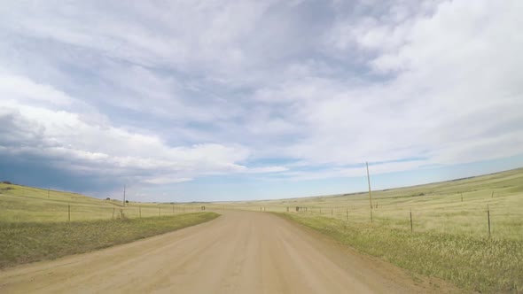 POV point of view - Driving through countryside in Eastern Colorado.