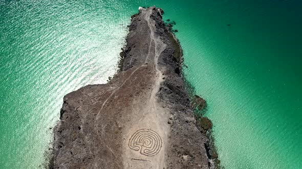 Aerial View Of Rocky Beach With Labyrinth Near Playa Balandra In Baja California Sur In Mexico. top-