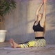 Female Coach Yoga Practicing Yoga or Stretching in Loft Studio on Mat - VideoHive Item for Sale