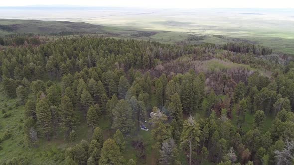 Aerial view of campsite in the Idaho forest viewing scars from wildfire